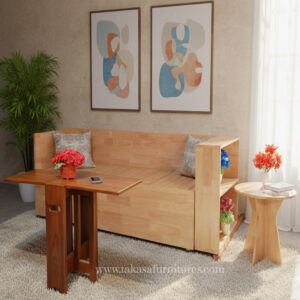 Compact living combo with sofa bed, laptop table, and small round table for modern homes.