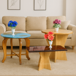 Outdoor round table with ocean blue and pink teapoy set for garden or balcony.