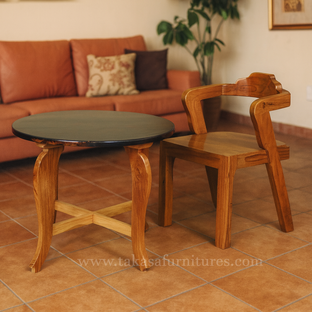 Stylish furniture duo featuring curved chair and minimalist black coffee table.